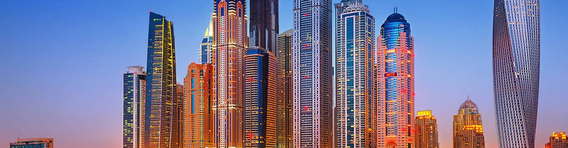 Sunset over historic Dubai skyline
